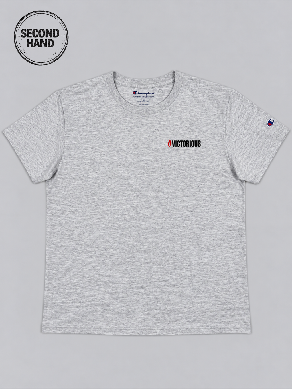 Champion T-Shirt in Hellgrau mit „Victorious“-Print S / M - second hand